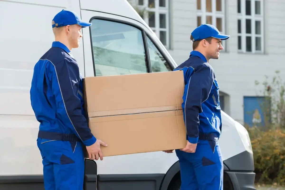 company movers team moving office furniture and equipment securely